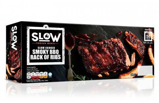 Food photograph of a pack of smoky barbecue ribs, the front of the box features a photograph of a rack of ribs glazed with barbecue sauce shot on a slate background