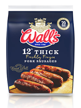 Food photograph of four Walls thick pork sausages with golden brown fries skins shot on a wooden board on a dark blue denim napkin. This image is used for the front of pack for Walls thick pork sausages and the pack is shown overlayed onto the photograph