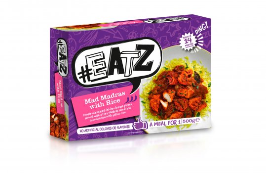 Food photograph of a plate of chicken madras with rice on the front of a ready meal pack